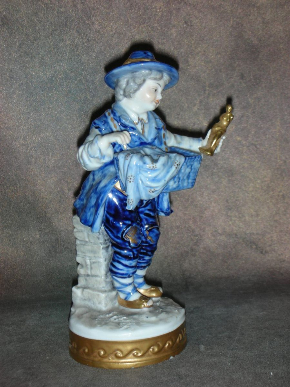 Статуэтка. Фарфор. Продавец кукол. Volkstedt. Германия