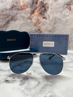 Солнцезащитные очки Gucci