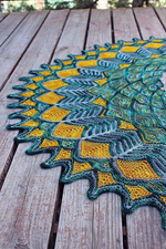 Описание по вязанию шали спицами "Feathers"