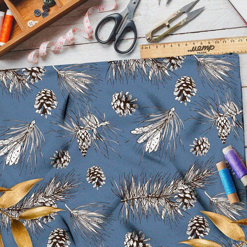 Ткань мембрана эскизы шишек и хвойных веток на синем фоне