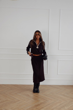 Костюм из трикотажа с поло и юбкой