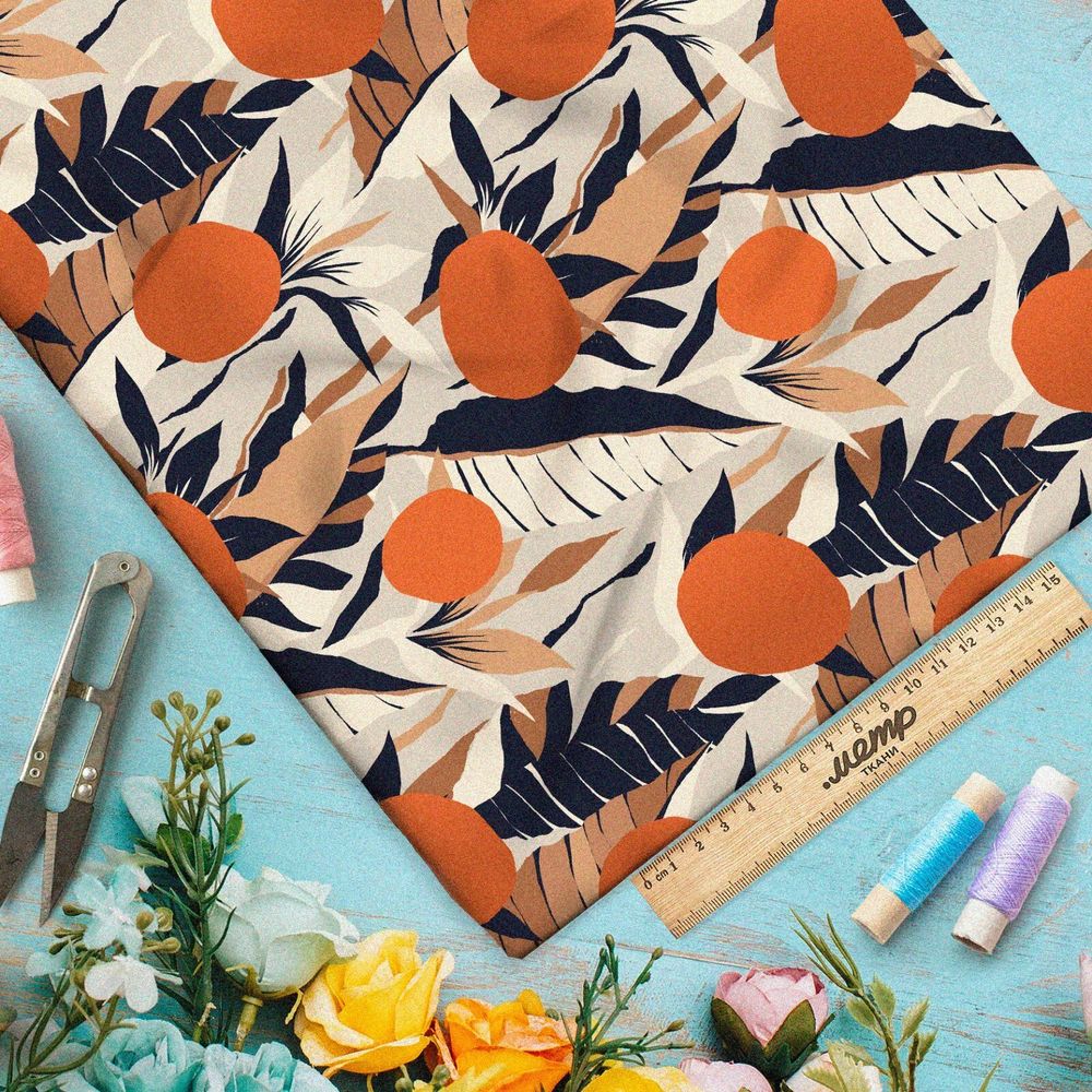 Ткань кулирная гладь оранжевая абстракция листьев