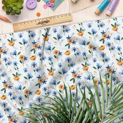 Ткань шифон оранжевые цветочки с голубыми листочками