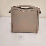 DORRIE mini жемчужная №3 - дефект кожи с торца сумки