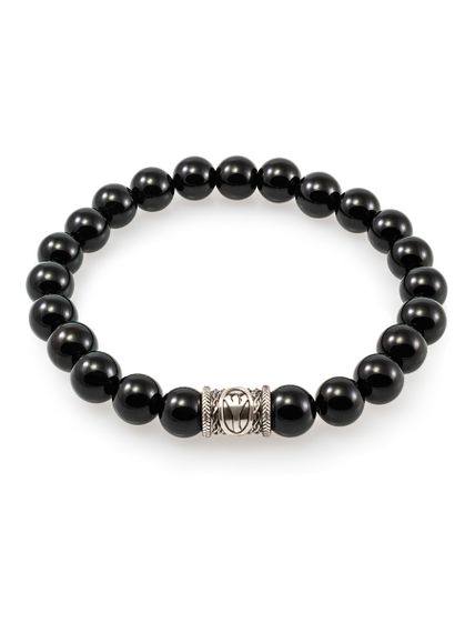 Фото браслета из черного кварца сверху на белом фоне.