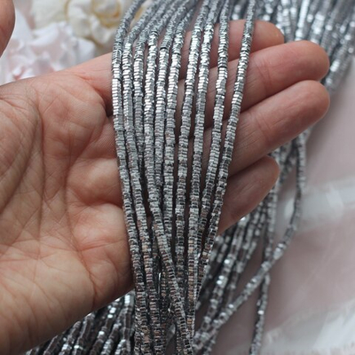 гшест31-с Гематит синт. шестигранник 3*1мм, серебро, нить 19см