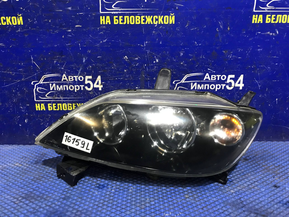 Фара передняя левая MAZDA DEMIO 2002-2005