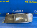Фара передняя левая NISSAN LARGO 1993