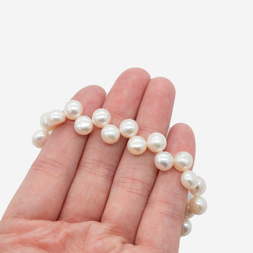 Жемчуг в форме булочки со смещенным отверстием белый, 7-7,5*6мм