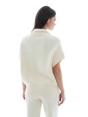 Молочный трикотажный костюм с жилетом