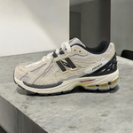 New Balance 1906D • Protection Pack Reflection