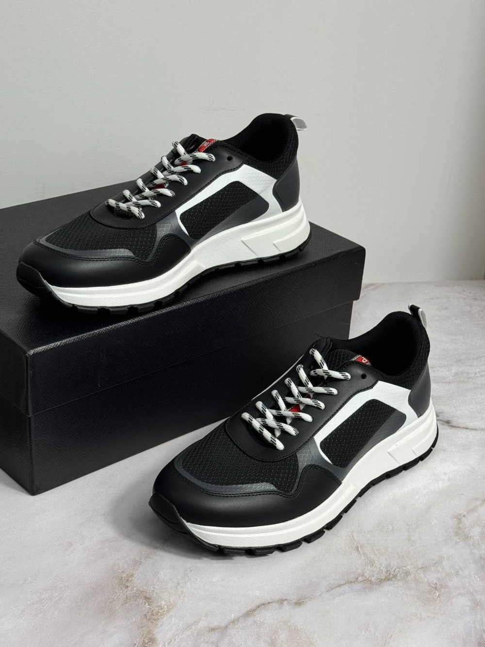 Кроссовки Prada