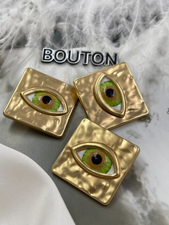 Пуговицы золотистые квадратные Скиап. с объемным зеленым глазом