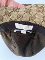 Панама Gucci, 86