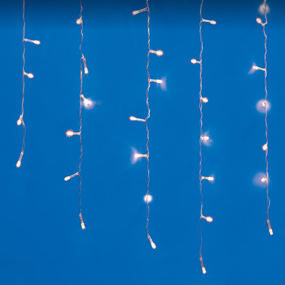 ULD-B6007-200-STK WARM WHITE IP44 Бахрома светодиодная со статическим свечением. 6м. Соединяемая. 200 светодиодов. Теплый белый свет. Провод прозрачный. ТМ Uniel