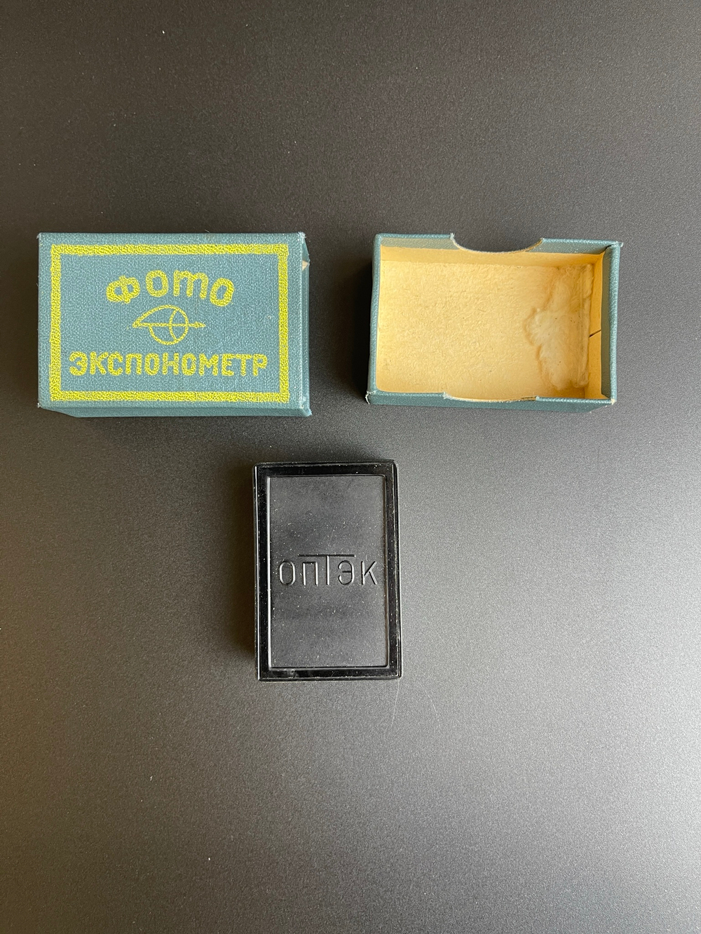 Экспонометр механический "ОПТЭК, пластик, Загорский оптико-механический завод (ЗОМЗ), СССР, 1960-1970 гг. в оригинальном футляре с документом