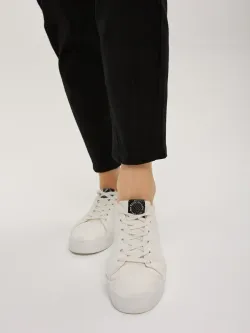 Джинсы бананы