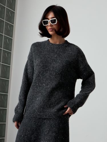 Трикотажный костюм с юбкой темно-серого цвета