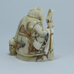 Эксклюзивная нэцкэ Монах с посохом и корзиной рыбы