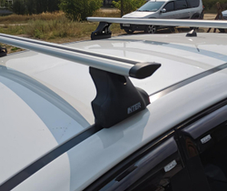 Багажник Интер Спектр на крышу Mazda 3 хэтчбек 2003-2009 в штатные места 8894 крыловидные дуги 120 см.