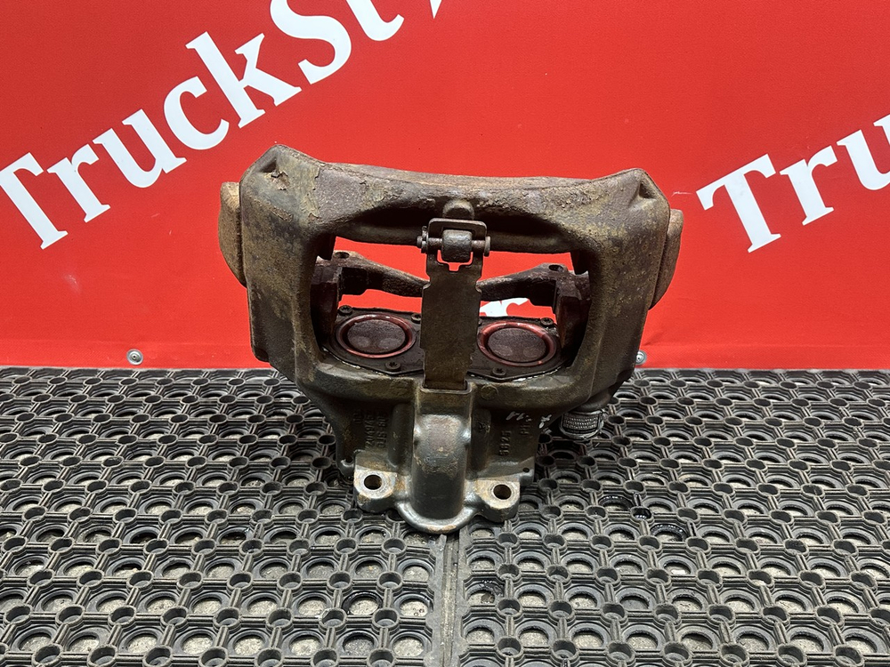 Суппорт задний левый