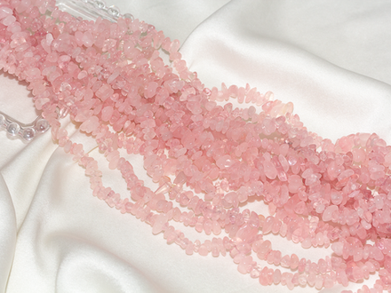 Нить бусины из розового кварца 9-11мм (галька)