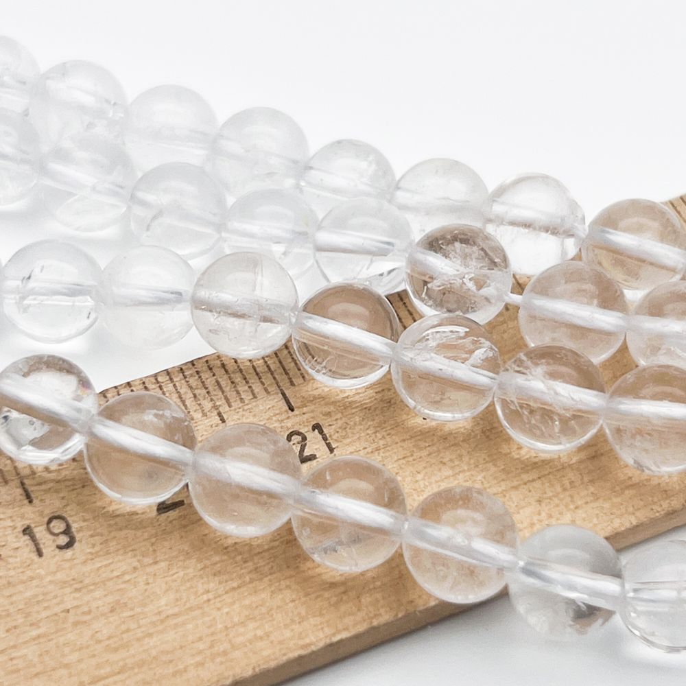 Горный хрусталь бусины, диаметр 7,7-7,9 мм, цена за 24 шт (1/2 нити)