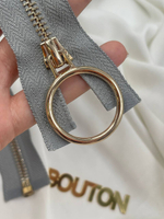 Молния серая с золотистым массивным кольцом