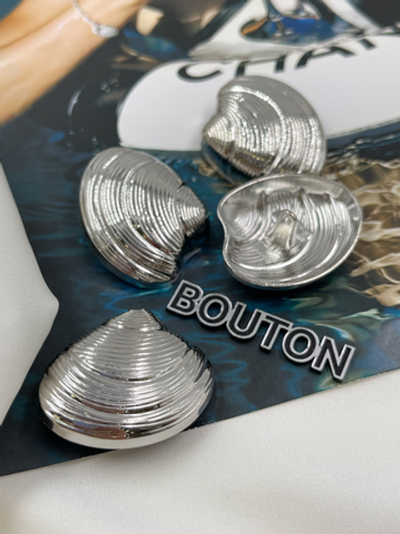 Пуговицы в форме ракушки серебристые