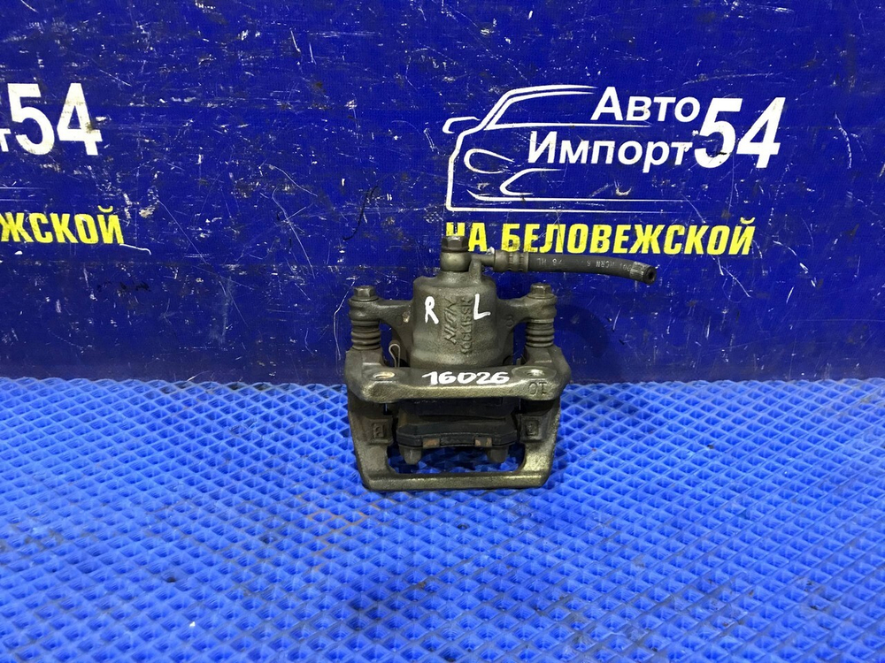 Суппорт тормозной задний левый Honda STEPWGN 1996-2001