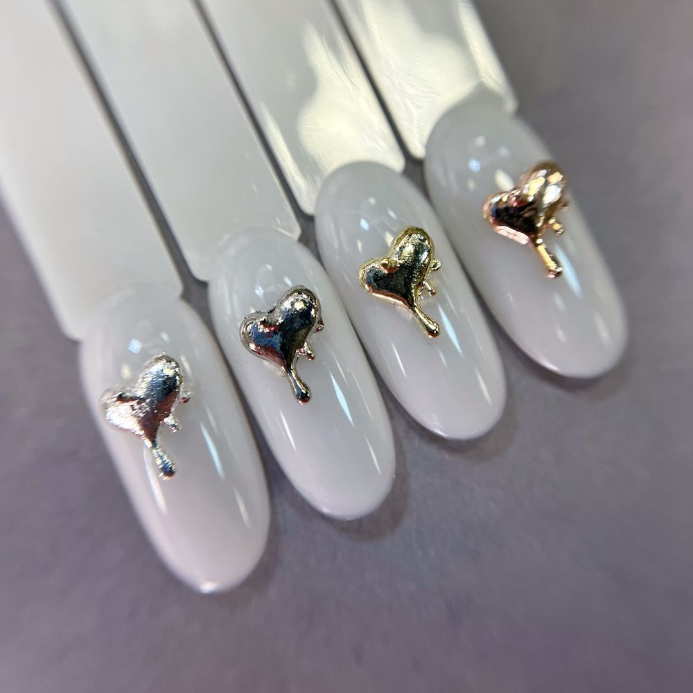 1852 Фигурки объёмные "Сердечки" металл 10 шт