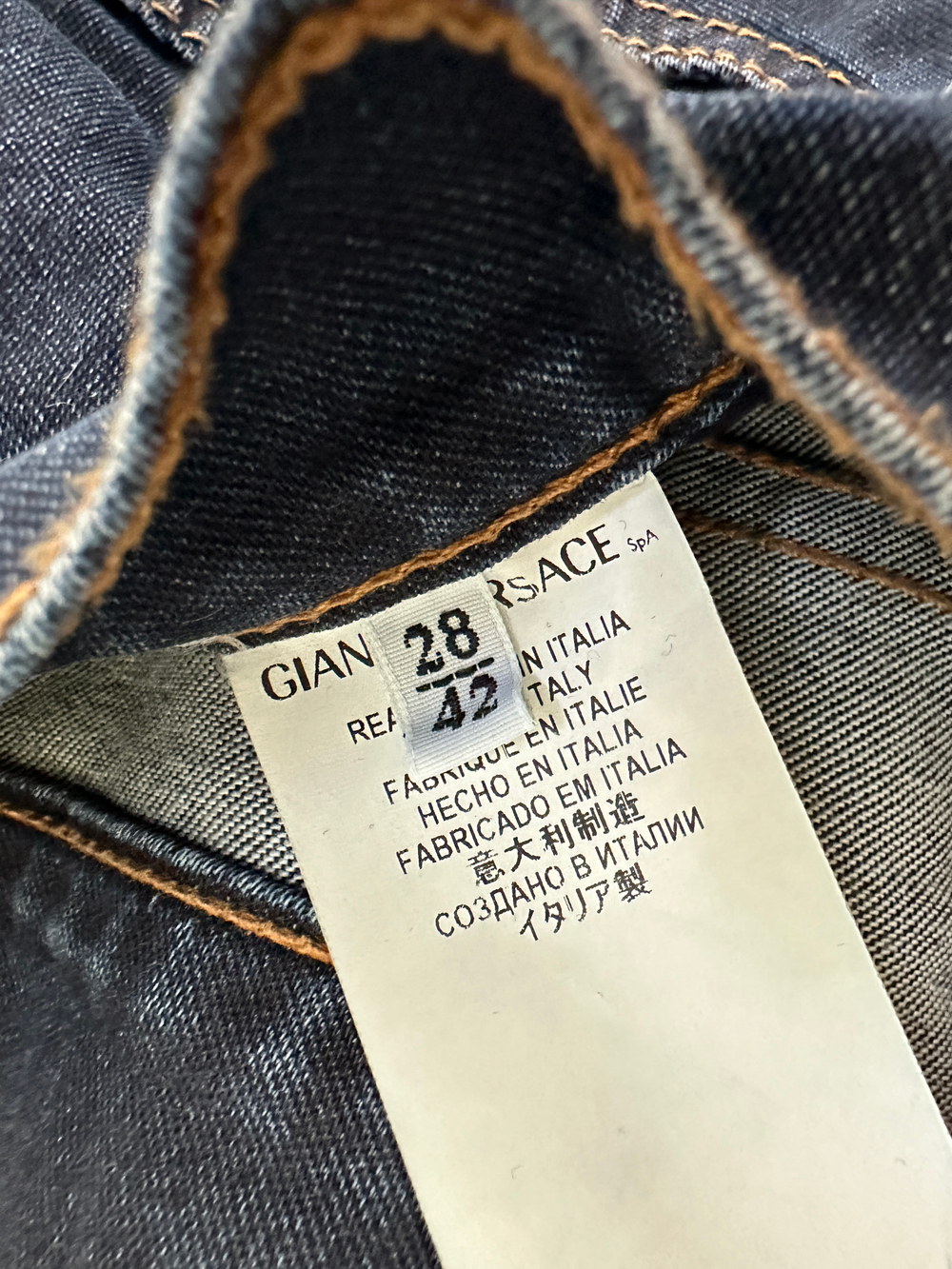 Джинсы Versace