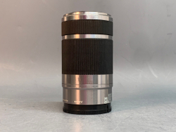 Sony 55-210mm f/4.5-6.3 E OSS внутри налет в виде точек