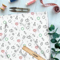 Ткань флис мелкий врачебный инвентарь на белом фоне