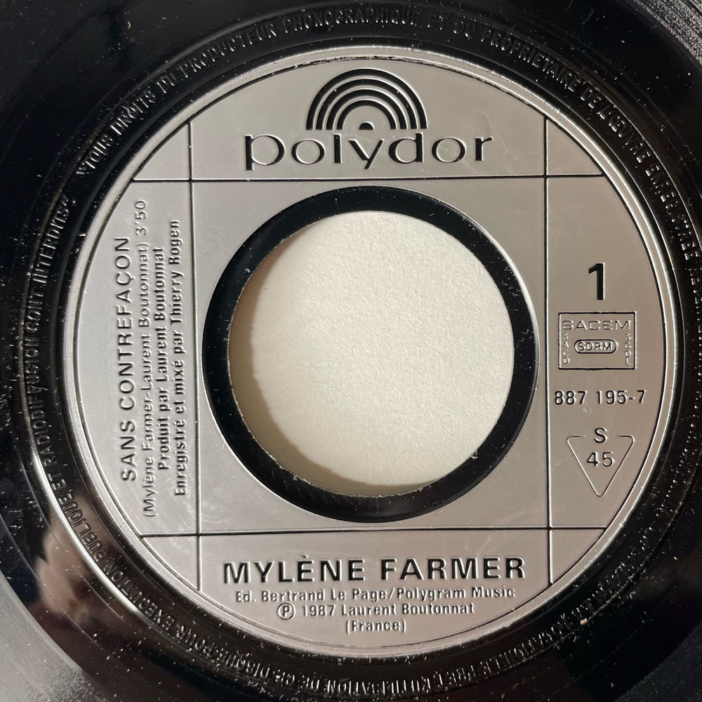 Винтажная виниловая пластинка 7 дюймов (маленькая пластинка) Mylene Farmer Sans Contrefacon (Франция 1987)