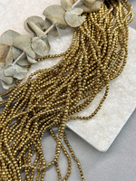 Гематит темное золото, граненный шар 3 мм, нить 40 см