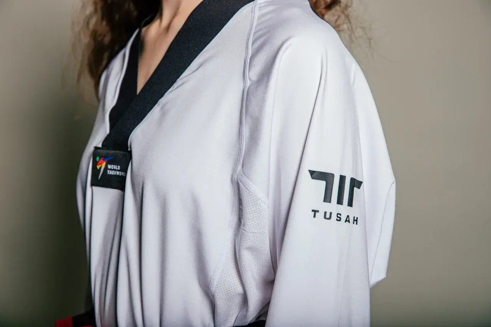 Добок WT Tusah Evo Uniform Female Dan