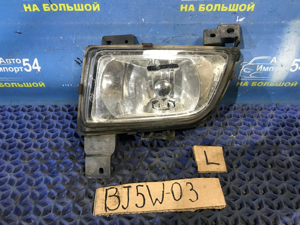 Туманка левая MAZDA FAMILIA 2001