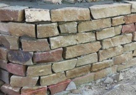 Masonry stone block