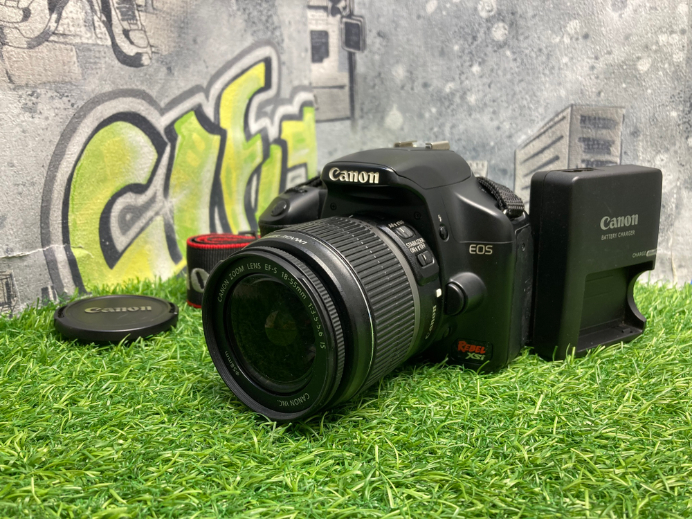 Canon Rebel Xsi + 18-55mm 3.5-5.6 IS 9.600 кадров