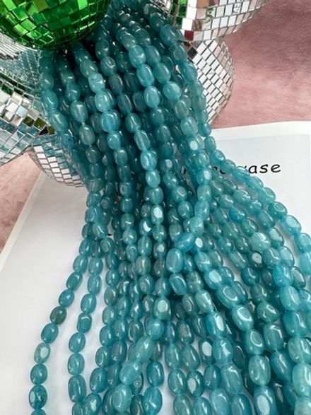 Нить бусин из тонированного кварца 7-8мм (галтовка)