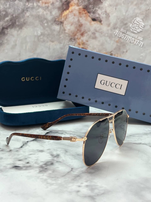 Солнцезащитные очки Gucci