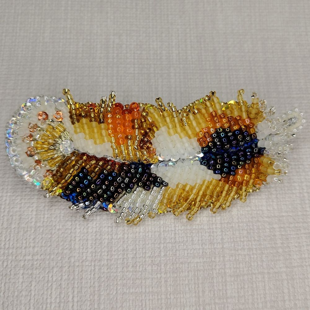 Авторская брошь Пёрышки