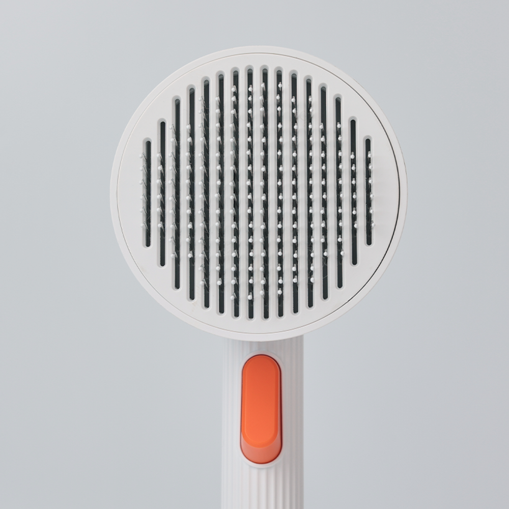 Щетка-чесалка для кошек и собак  Pet Grooming Brush 2