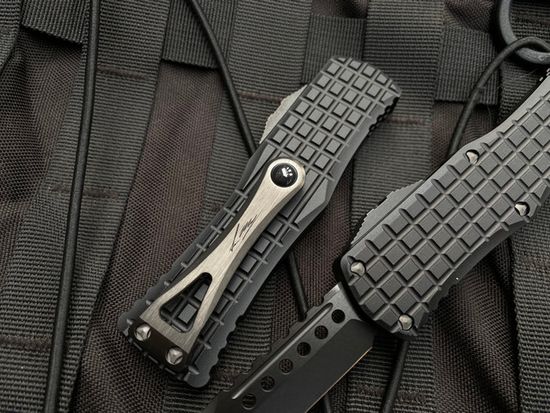 Автоматический нож Microtech MT_919-1TFRS Hera Hellhound, алюм. черн. рук-ть FRAG pattern, клинок DLC