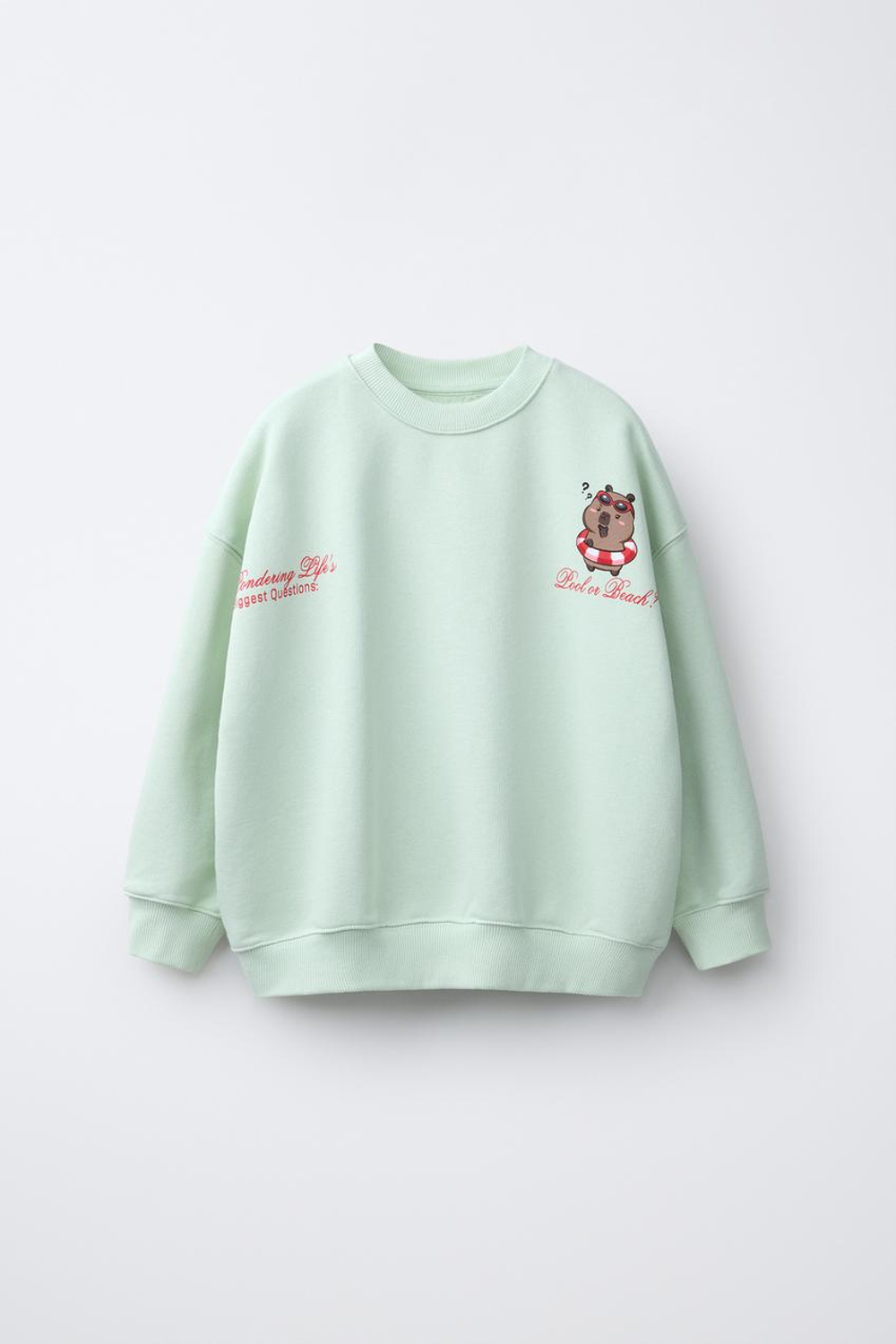 ZARA ТОЛСТОВКА С ПРИНТОМ «КАПИБАРА CAPYFUN ©», СВЕТЛО-ЗЕЛЕНЫЙ