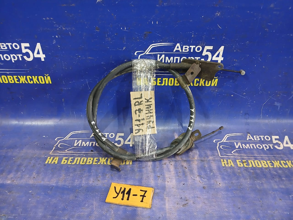 Трос ручника левый NISSAN AD 1999-2008