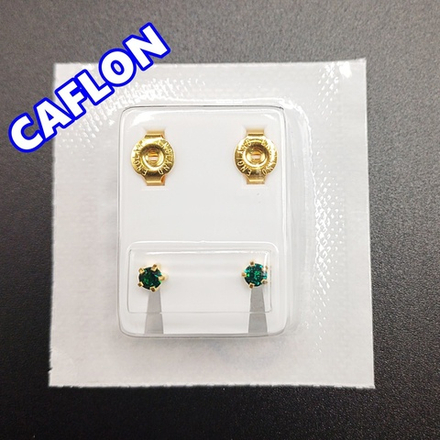 Серьги-гвоздики для прокола ушей под пистолет. CAFLON (Англия). Золотистые с темно-зелеными ( Май) кристаллами, крапление