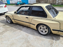 BMW E30 PANDEM (ROCKET BUNNY) Задняя левая накладка (Реплика "Стекловолокно")