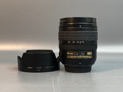 Nikon 18-70mm 3.5-4.5G царапка на передней линзе